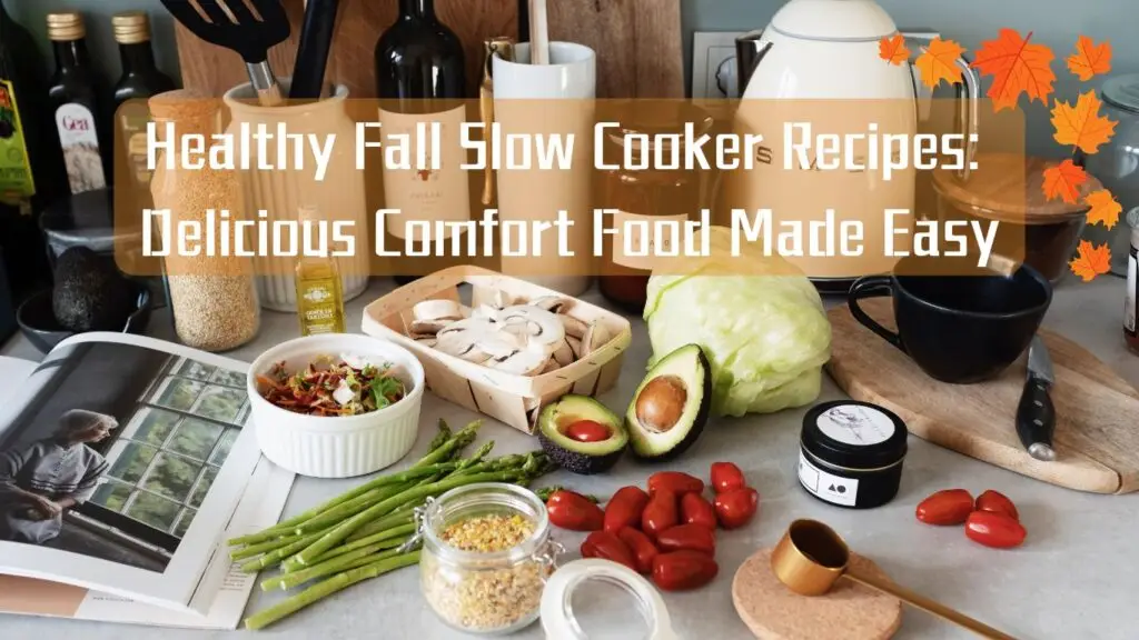 A kitchen counter is filled with various ingredients and items, including mushrooms, a head of cabbage, an avocado cut in half, green beans, oats, and a jar labeled ‘Himalayan Pink Salt’. There’s also a slow cooker and a book opened to a page featuring a salad. The image has an overlay of orange leaves at the top right corner and text that reads “Healthy Fall Slow Cooker Recipes: Delicious Comfort Food Made Easy.”