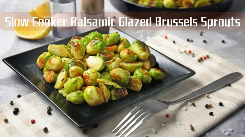 A plate of balsamic glazed Brussels sprouts garnished with lemon and spices.