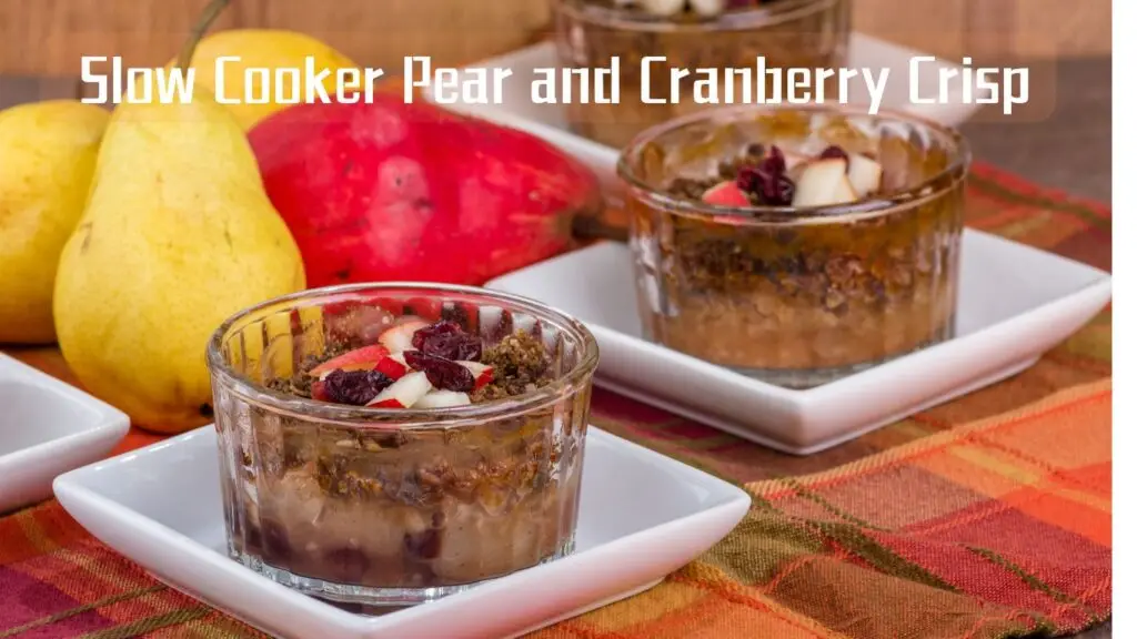 Two glass bowls of pear and cranberry crisp on white square plates, with whole pears and a red napkin in the background, titled “Slow Cooker Pear and Cranberry Crisp.”