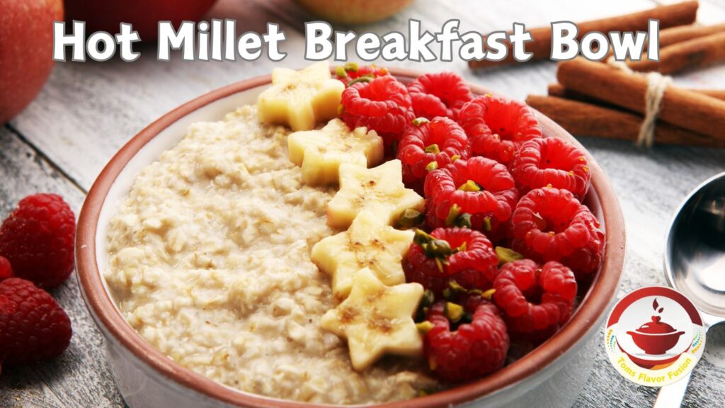 A bowl of hot millet porridge topped with star-shaped banana slices and fresh raspberries, with cinnamon sticks and an apple in the background. The text "Hot Millet Breakfast Bowl" is displayed at the top, and a logo for "Toms Flavor Fusion" is at the bottom right.