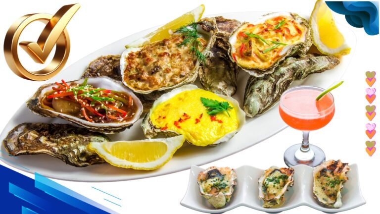 A plate of assorted baked oysters with lemon wedges and a cocktail.